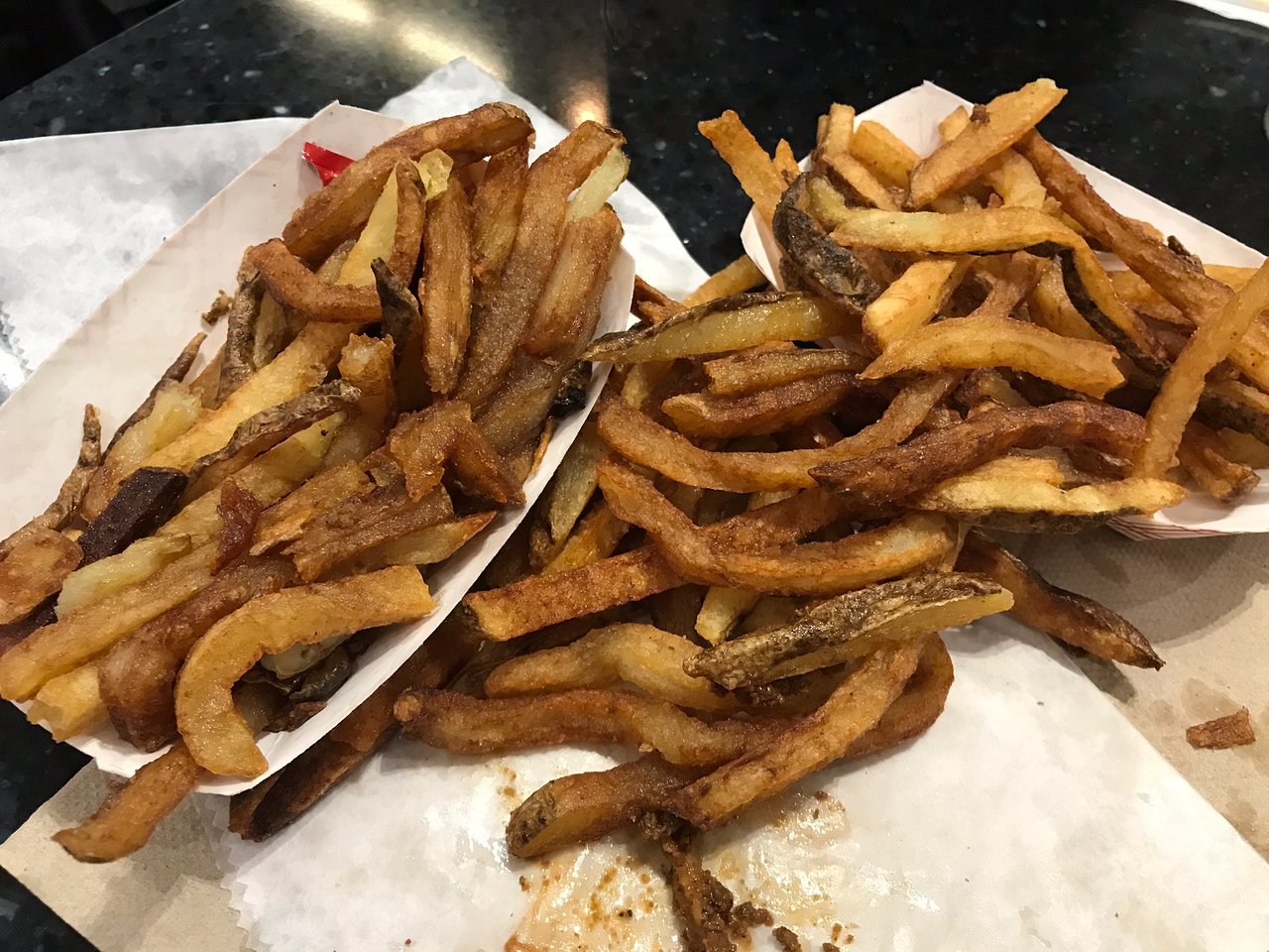 Turn up the heat with crispy fries topped with cheese curds, rich gravy, grilled chicken, spicy hot peppers, and a drizzle of bold hot sauce - a perfect balance of heat and comfort in every bite.